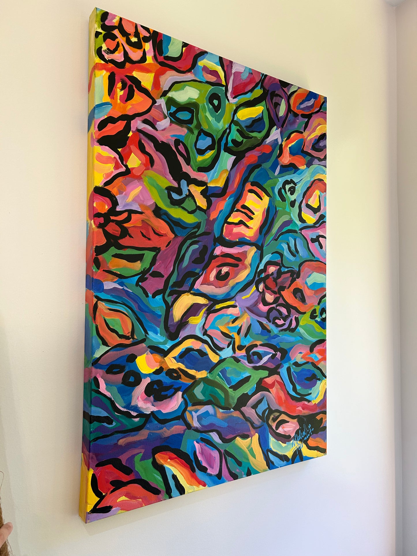 Colorful abstract painting on a white wall